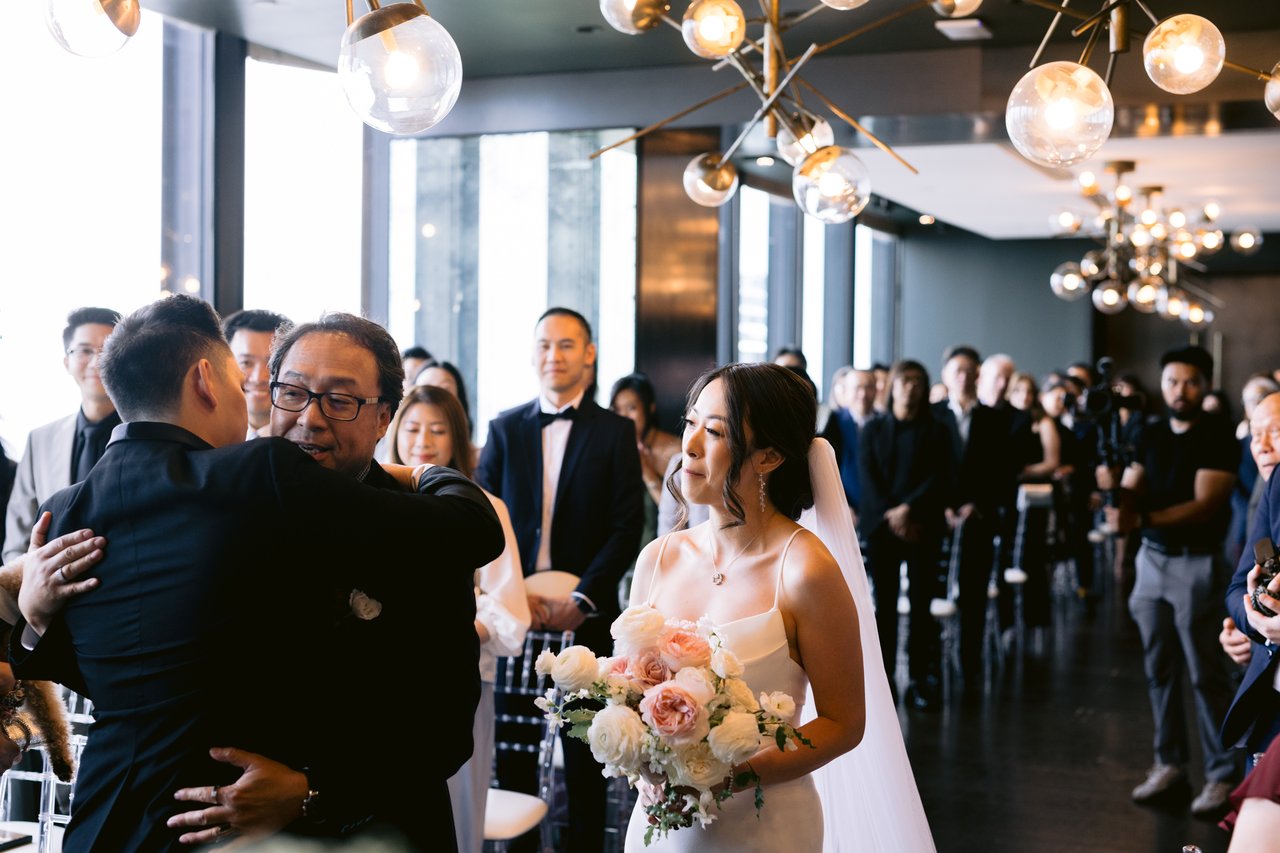 The ceremony, guests gathered, the couple at the front