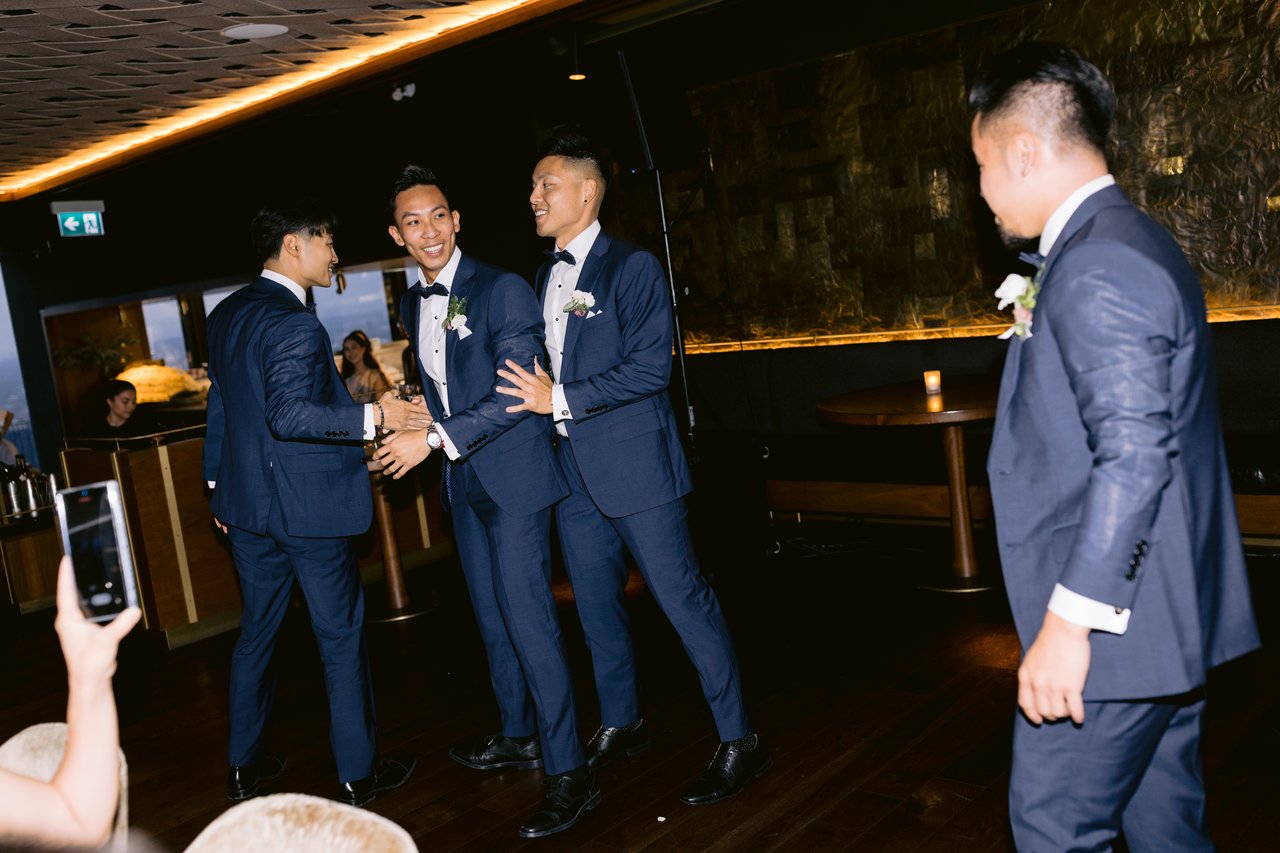 The groomsmen dancing