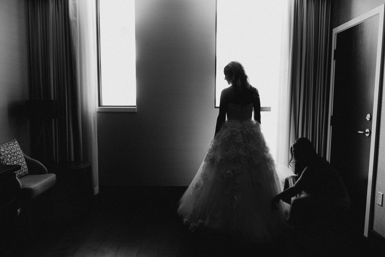 Magda in the hallway, in black and white