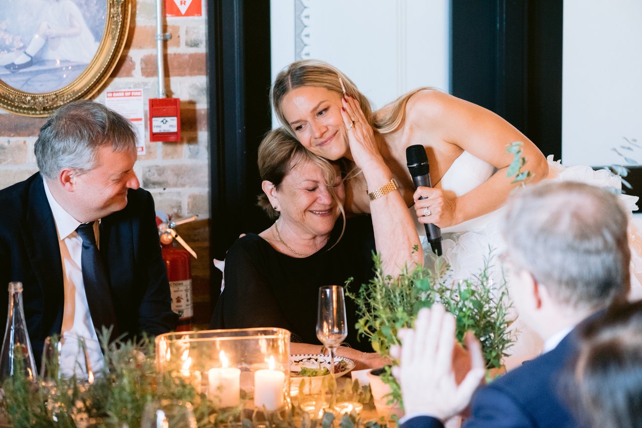 A toast, the table laughing