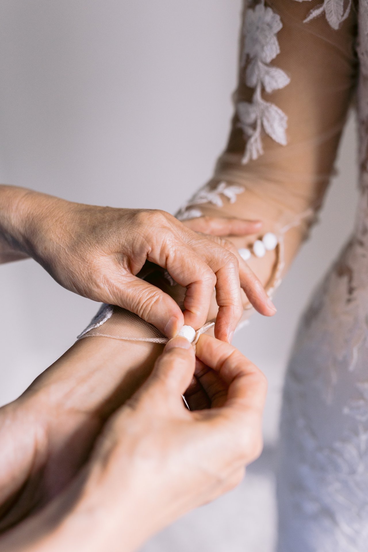 A ring slipped on, the lace sleeve close