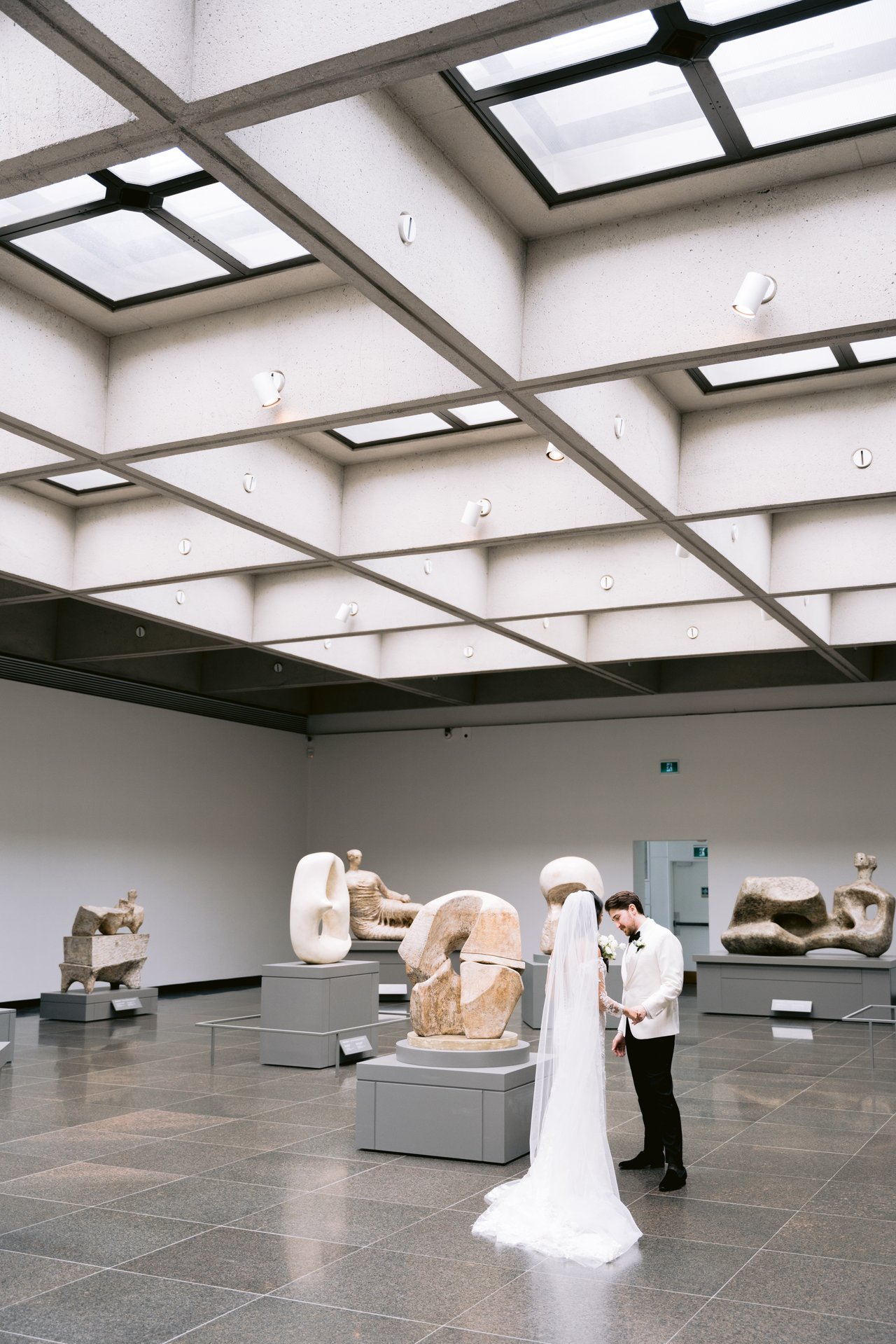 Stella and Will in the Henry Moore gallery, light from the skylights