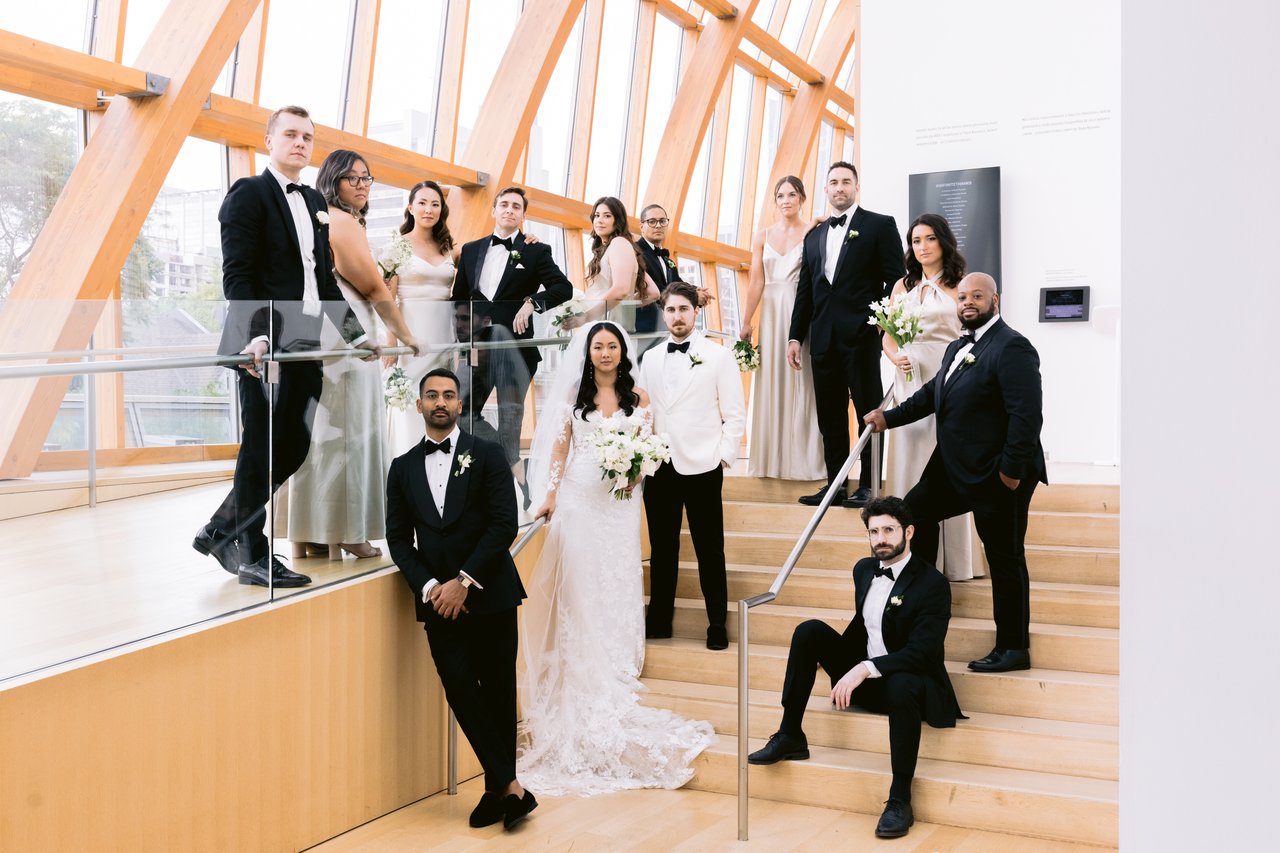 The wedding party on the stairs