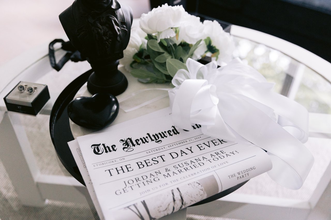 The Newlywed Times and white florals on the table