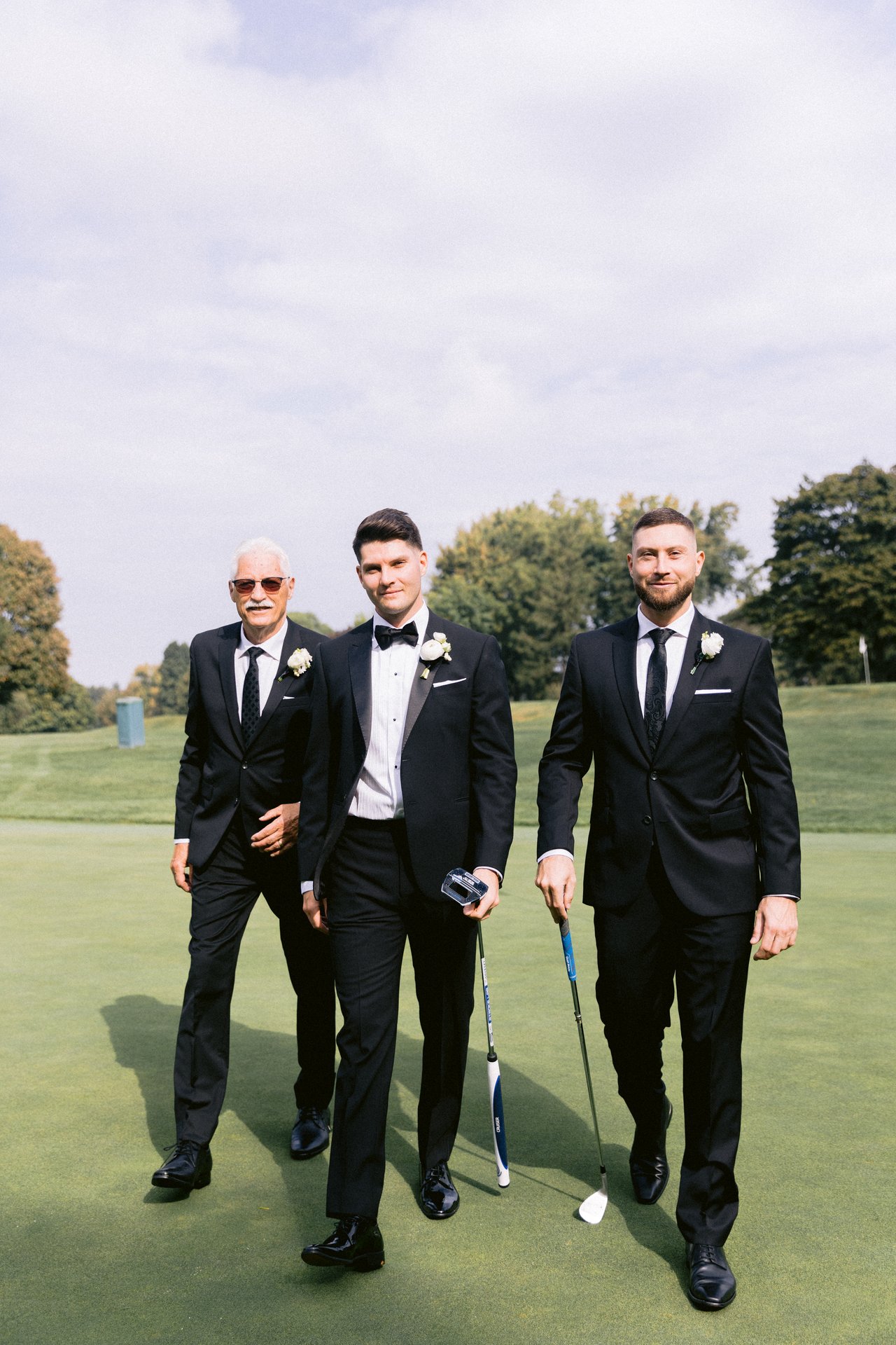 The groomsmen walking out