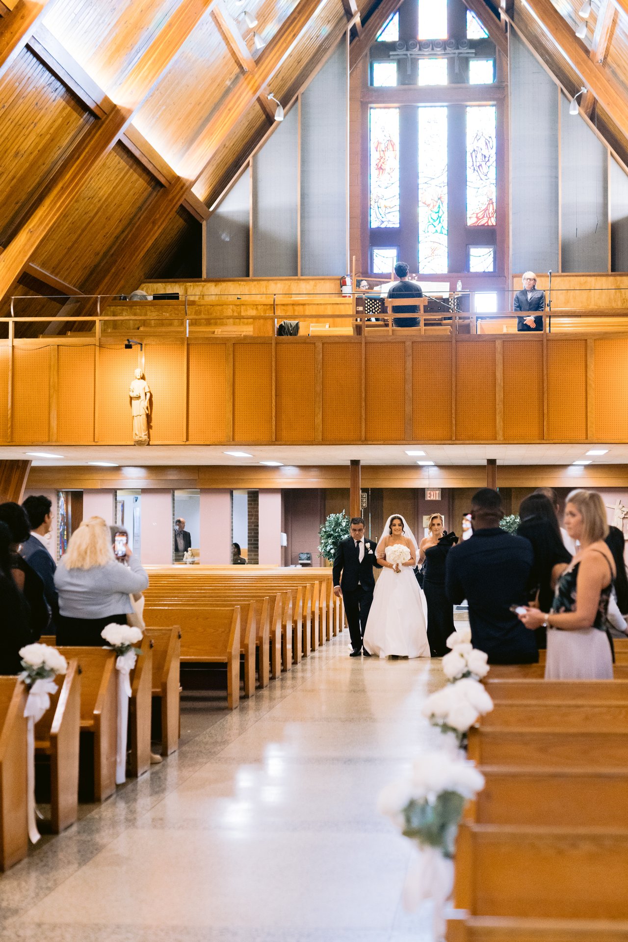 The ceremony beneath the beams
