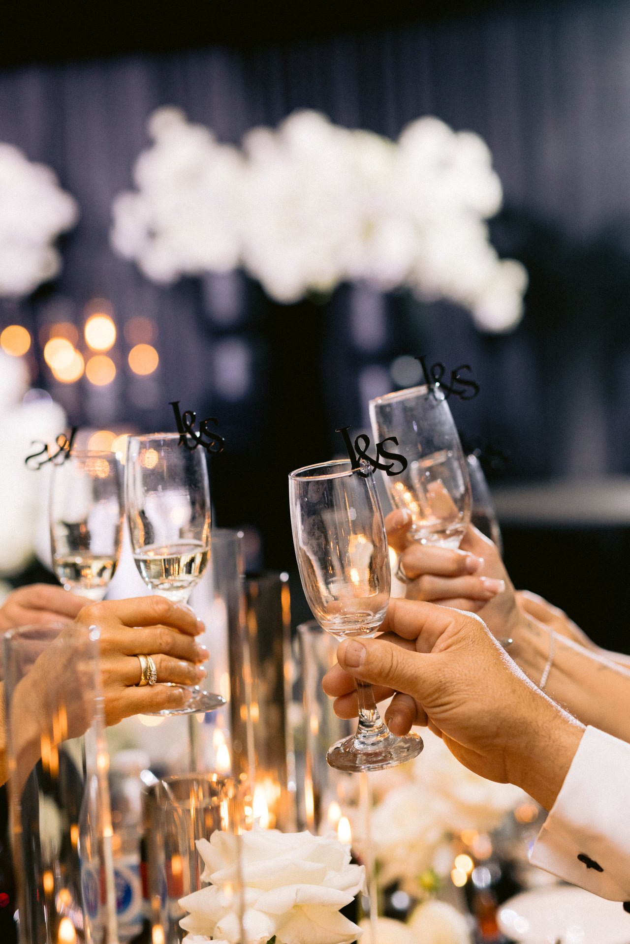 A toast, glasses up
