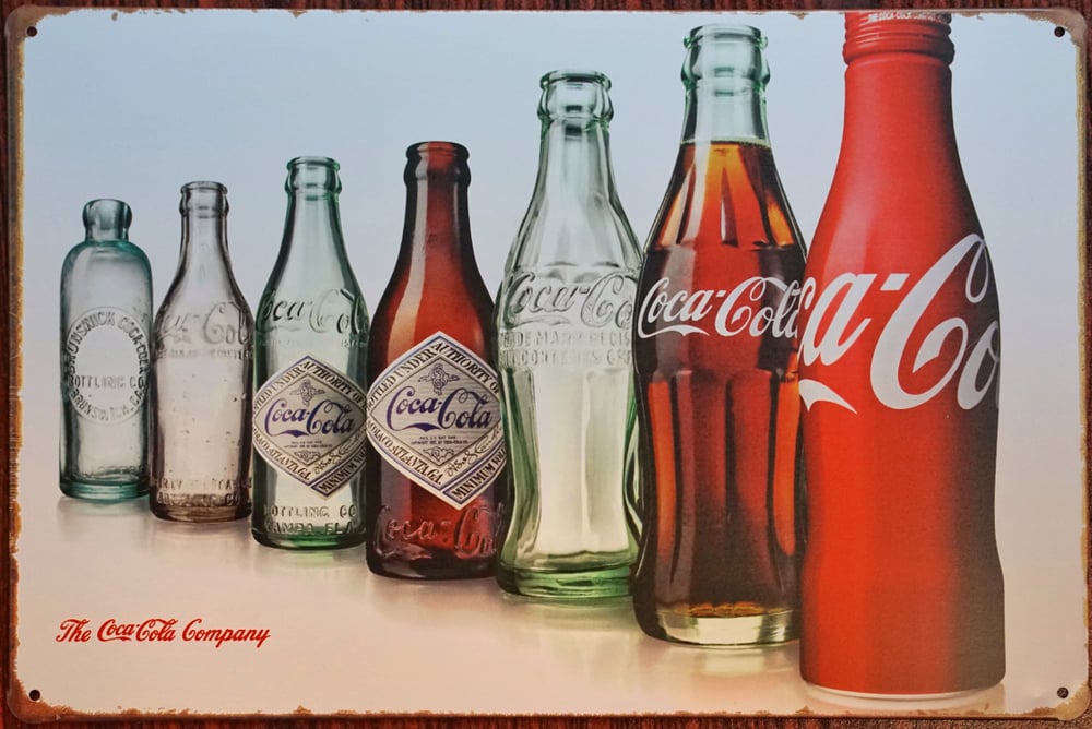 Coca Cola bottles from different time periods