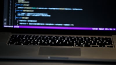 OpenAI's GPT-5.3-Codex tops benchmarks, claims it helped build itself