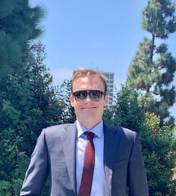 Professional headshot of Kai Youngman, Co-Founder | Operations of SRK CAPITAL