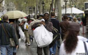 巴塞隆納「毛毯人」  不賣山寨貨換新生