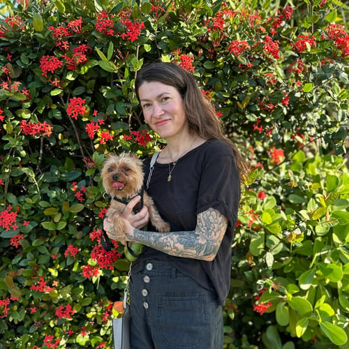 A detailed black and grey floral pattern tattoo on the arm with intricate flower designs — by Melanie Benoit, los angeles