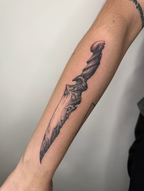 black & grey dagger tattoo — by Level tattoo, los angeles