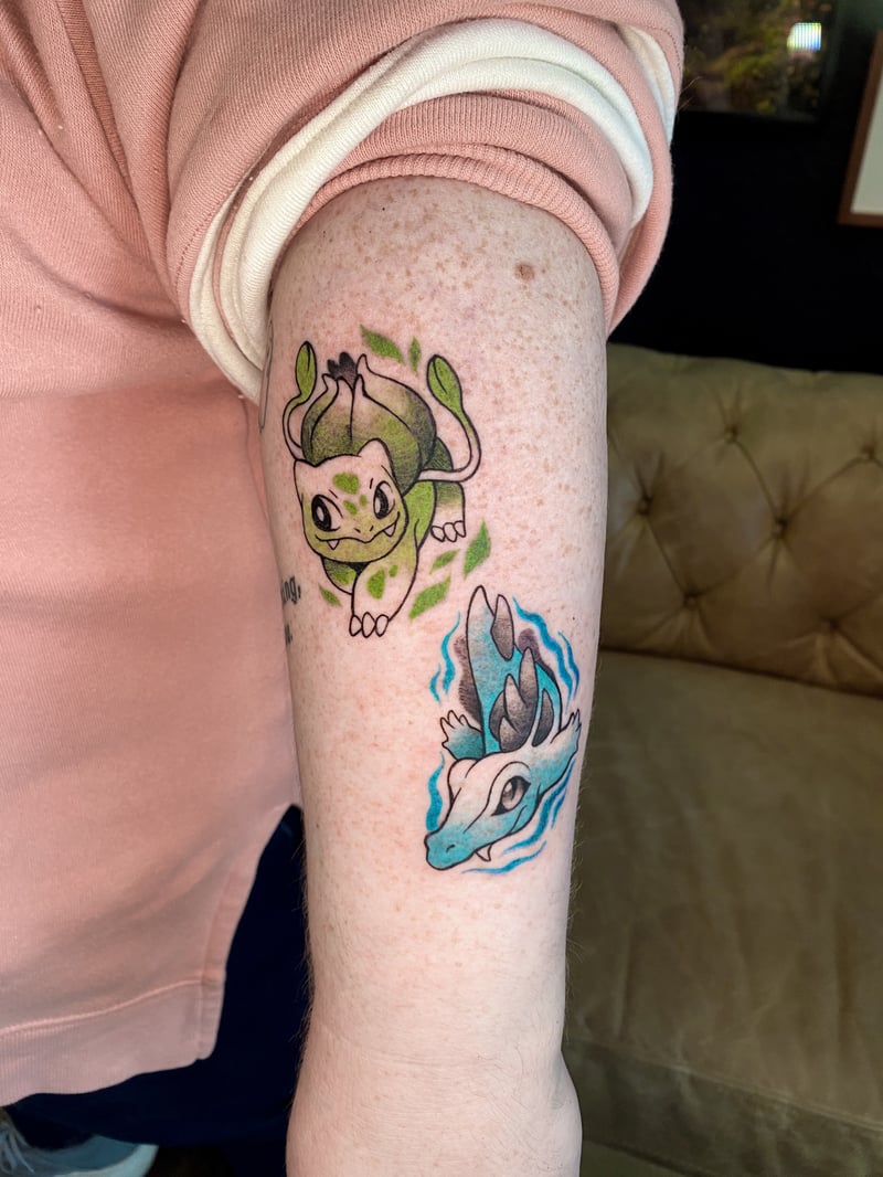 clean color pokémon tattoo of Bulbasaur and a blue water-type by katlyyons, an anime tattoo artist in mid-city, los angeles