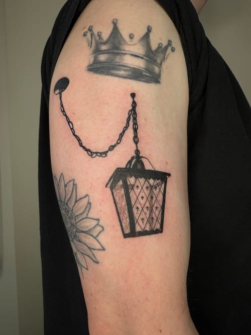 blackwork hanging lantern with crown tattoo — by Level tattoo, los angeles