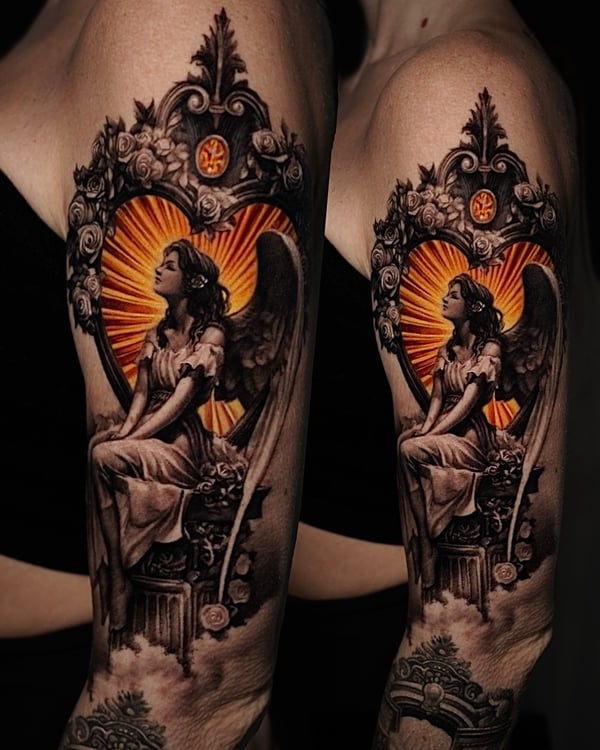 A realistic black and grey tattoo of an angel sitting on a column with roses, featuring ornate details and a vibrant orange background on the upper arm — by Vladimir Kozachenko, los angeles