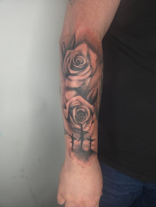 black & grey roses with crosses tattoo — by ashynucklestattoo, los angeles