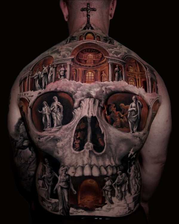 A surreal full back tattoo featuring a realistic skull integrated with classical architecture and statues, using a mixed color palette — by Vladimir Kozachenko, los angeles