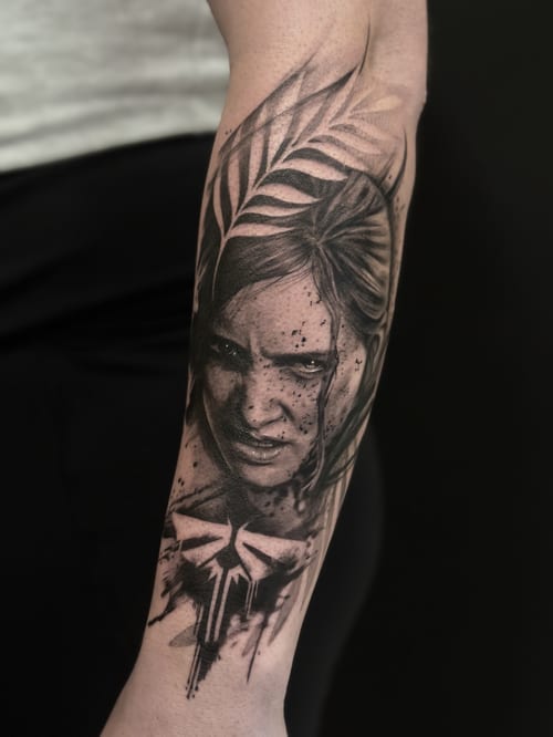 A realistic black and grey portrait of a woman on the forearm, featuring detailed shading and a leaf accent above the head — by Jian Liang, los angeles