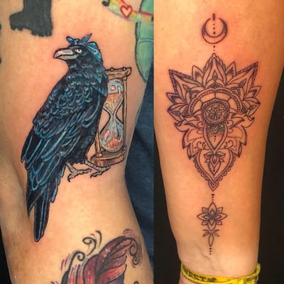 A mixed color and blackwork tattoo featuring a raven with an hourglass and an ornamental mandala with a crescent moon on the forearm — by Sandra Price, los angeles