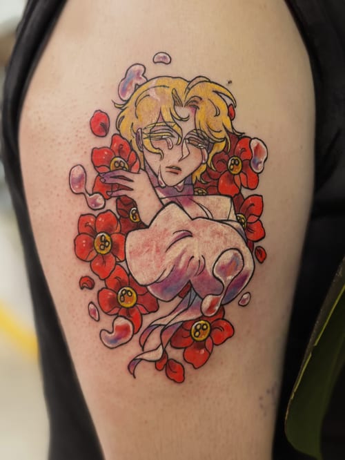 A colorful anime-style tattoo of a woman surrounded by red flowers on the upper arm, featuring bold outlines and vibrant colors — by Tweetwee, los angeles