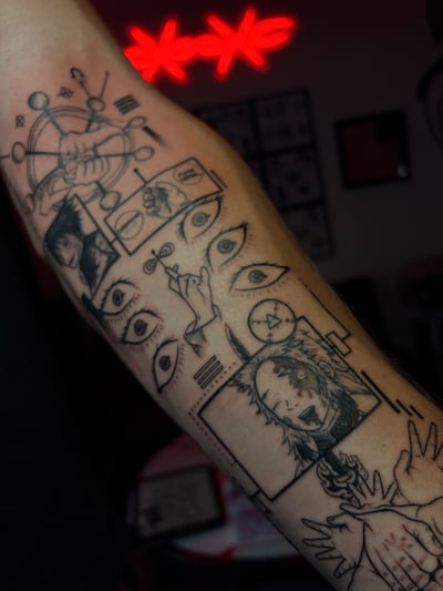 A black and grey illustrative tattoo on the forearm featuring multiple eyes, faces, and hands with intricate linework and abstract elements — by Vince Espinoza, los angeles