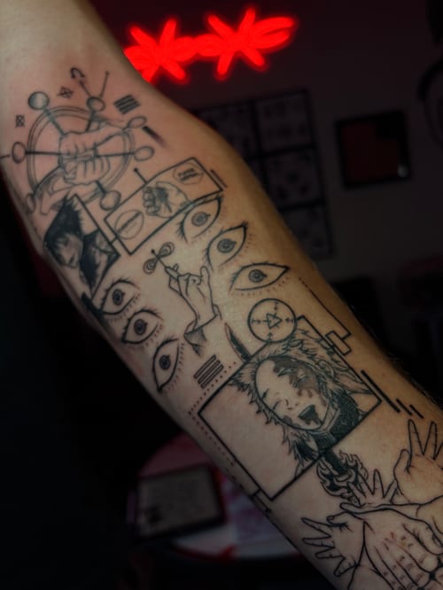 A black and grey illustrative tattoo on the forearm featuring multiple eyes, faces, and hands with intricate linework and abstract elements — by Vince Espinoza, los angeles