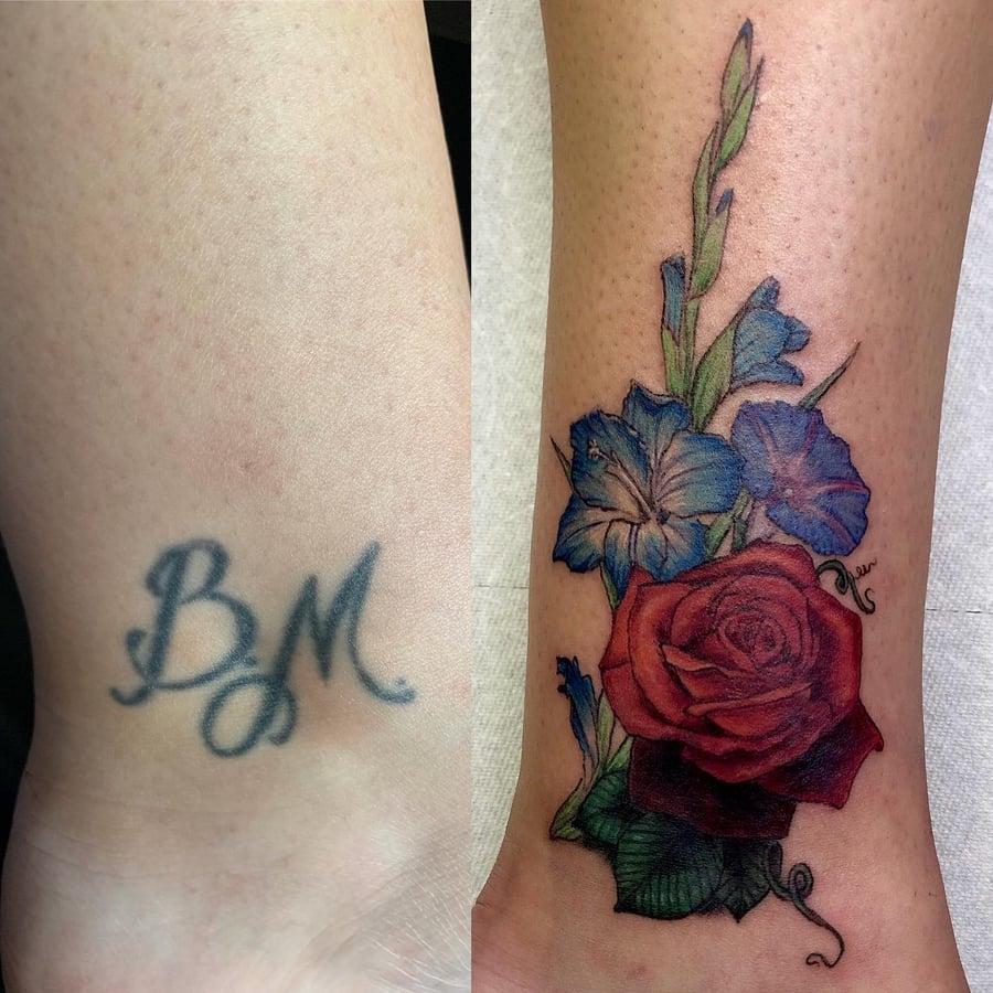 A colorful cover-up tattoo featuring a realistic rose and blue flowers on the ankle — by Sandra Price, los angeles