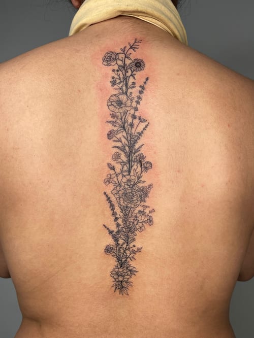 fine line vertical floral arrangement tattoo — by Vince Espinoza, los angeles