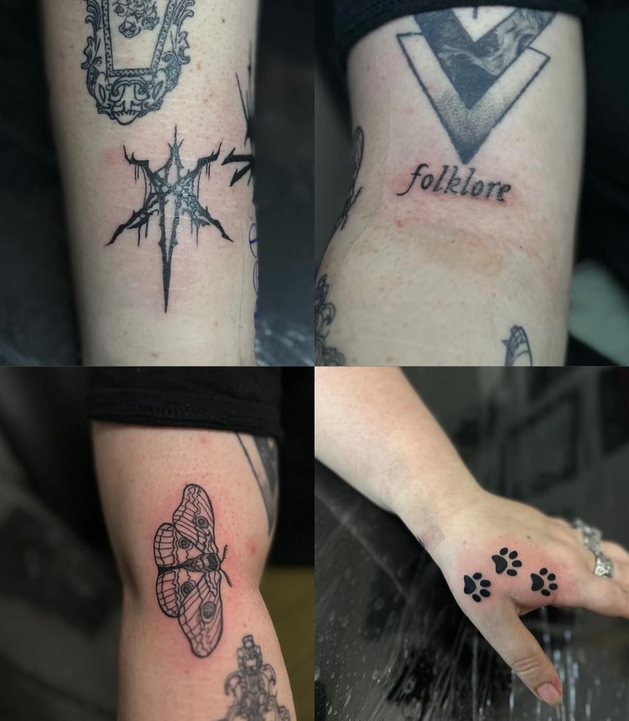 A collection of small blackwork tattoos including script, a moth, and paw prints on the forearm and hand — by Maddie Ramirez, los angeles