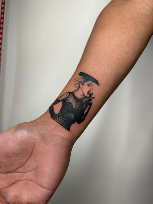 black & grey woman in graduation cap tattoo — by Level tattoo, los angeles
