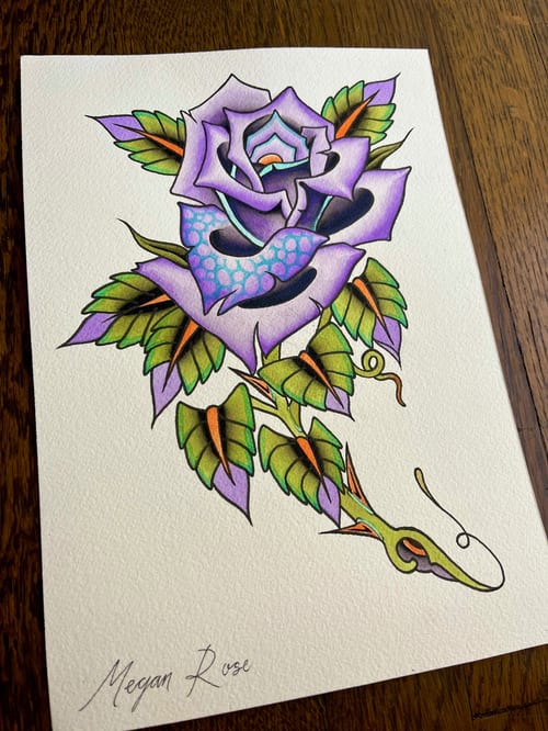 A colorful neo-traditional tattoo design featuring a purple rose entwined with a snake, showcasing bold outlines and vibrant colors — by Megan Rose, los angeles