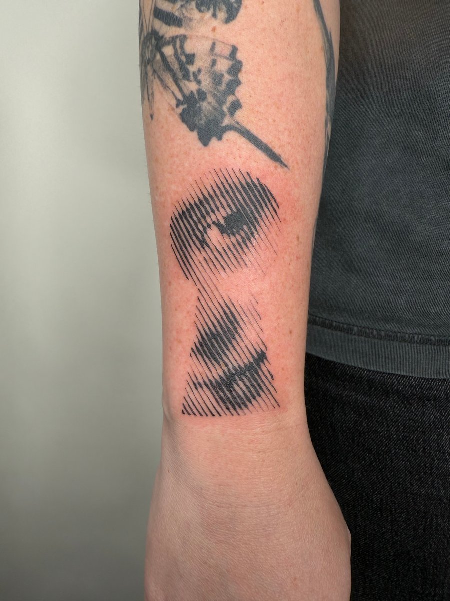 linework face tattoo — by Level tattoo, los angeles