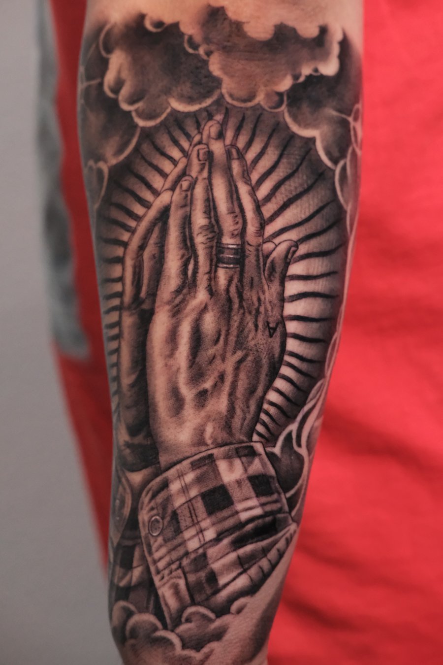 realism praying hands tattoo — by Johnny Ayala, los angeles