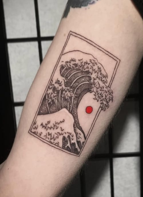 A minimalist linework tattoo of a wave with a red sun on the forearm, featuring simple lines and a touch of color — by Shelby Bianco, los angeles
