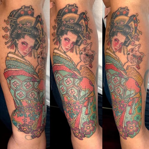 A colorful Japanese-style tattoo of a geisha holding a mask on the forearm, featuring intricate floral patterns and vibrant colors — by Sandra Price, los angeles