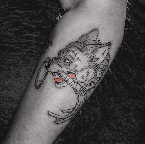 neo-traditional wolf with razor tattoo — by Tag Devilish, los angeles