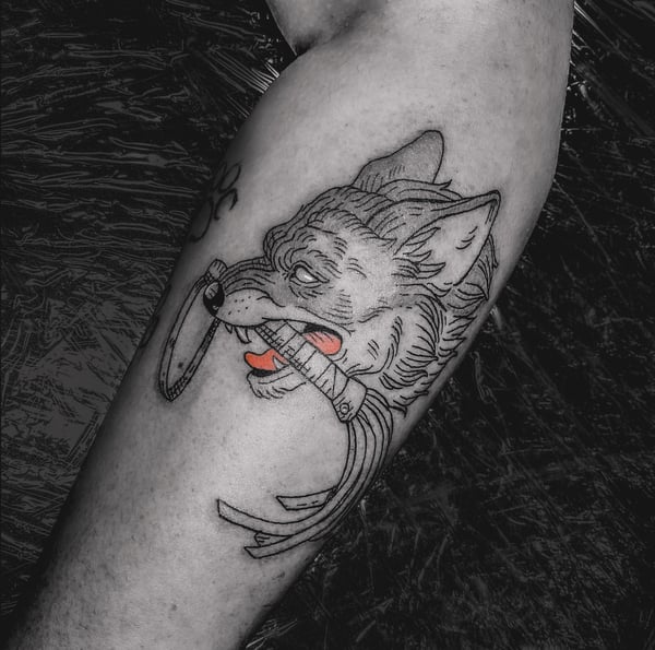 neo-traditional wolf with razor tattoo — by Tag Devilish, wrightwood, ca