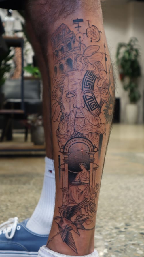 black & grey ancient figure with geometric patterns tattoo — by Vince Espinoza, los angeles