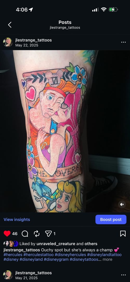 A colorful illustrative tattoo on the leg depicting Hercules with vibrant flowers and script, showcasing a playful and bold design — by Jessica Linden, los angeles