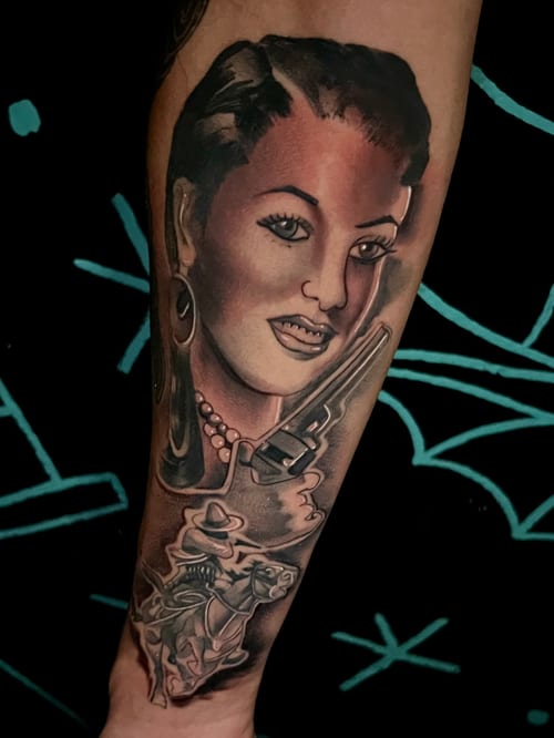 A realistic portrait of a woman with a gun on the forearm, featuring detailed shading and a mix of color and black and grey elements — by Josue Bravo, los angeles