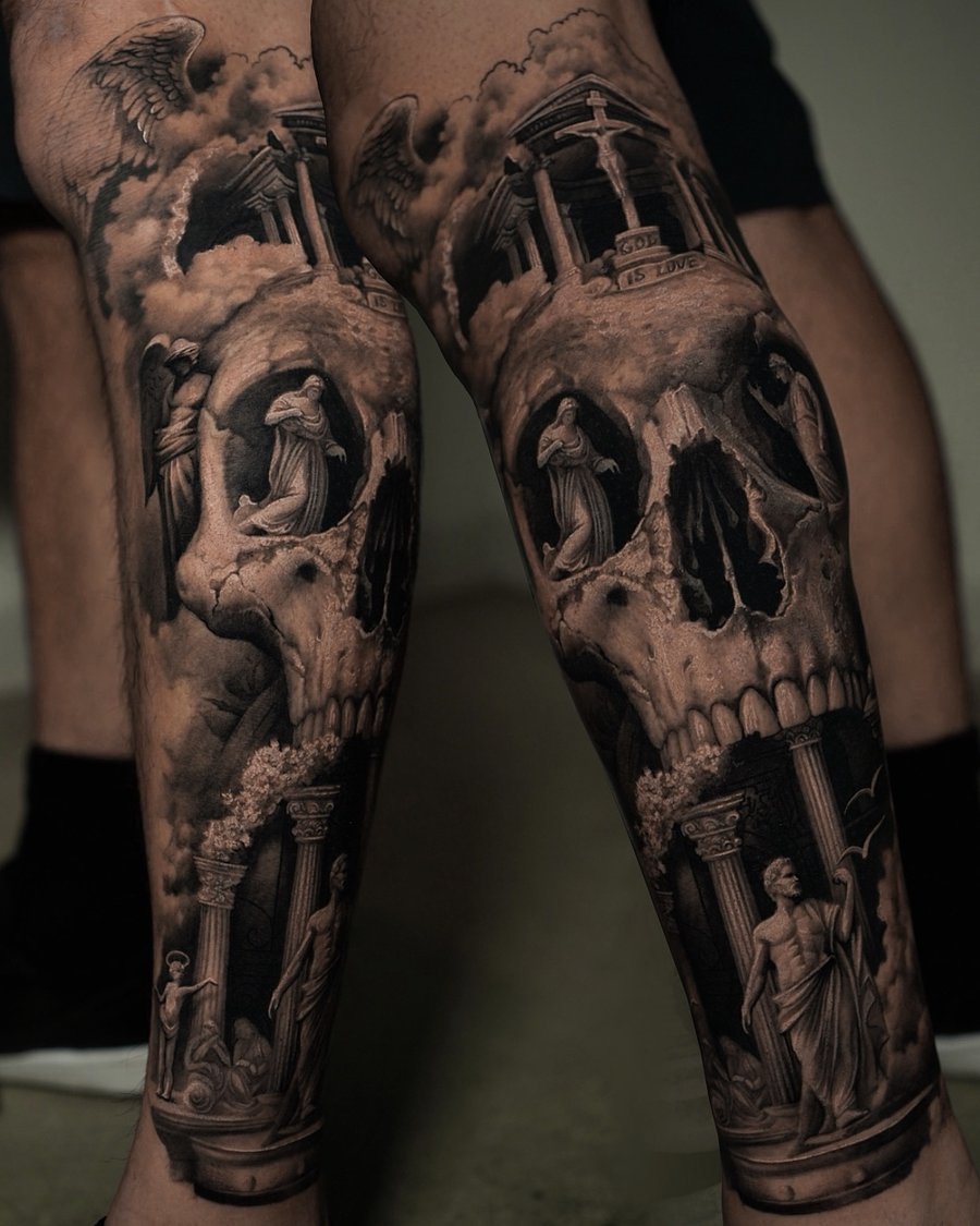 A detailed black and grey tattoo featuring a skull with statues and architectural elements on the leg, creating a dark and ornate design — by Vladimir Kozachenko, los angeles