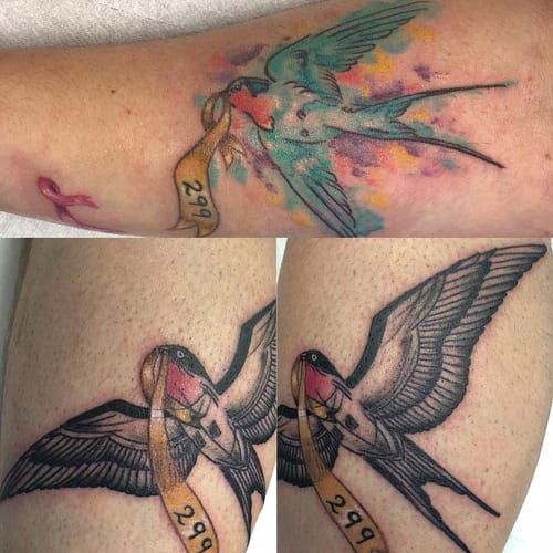 A colorful swallow with a ribbon tattoo on the forearm, combining traditional and watercolor styles — by Sandra Price, los angeles