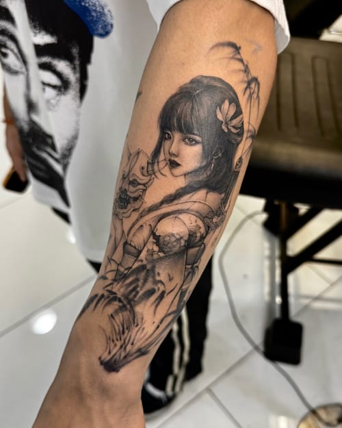 A detailed black and grey realism tattoo of a woman holding a sword on the forearm, featuring intricate shading and fine lines — by otaybeatdown, los angeles