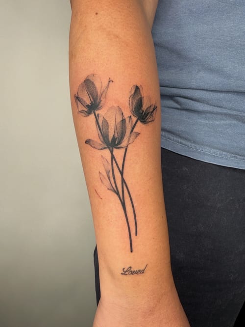 fine line three flowers tattoo — by Level tattoo, los angeles