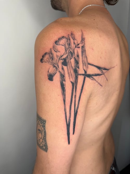 blackwork flowers tattoo — by Level tattoo, los angeles