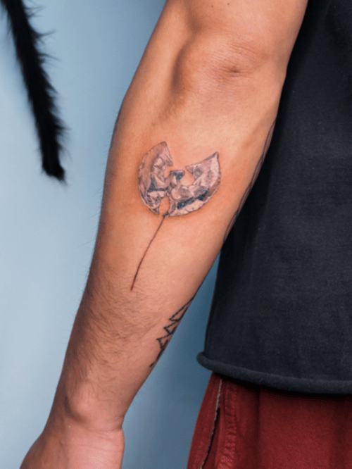 blackwork wu-tang clan logo tattoo — by lunayflorestattoo, los angeles