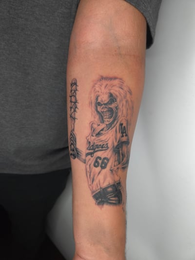 black & grey skeleton baseball player tattoo — by ashynucklestattoo, los angeles