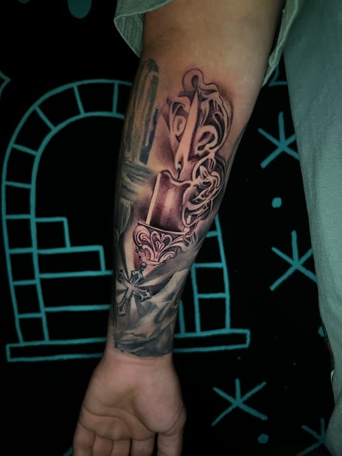 A realistic black and grey tattoo of a sword with intricate details on the forearm, featuring ornate designs and shading — by Josue Bravo, los angeles