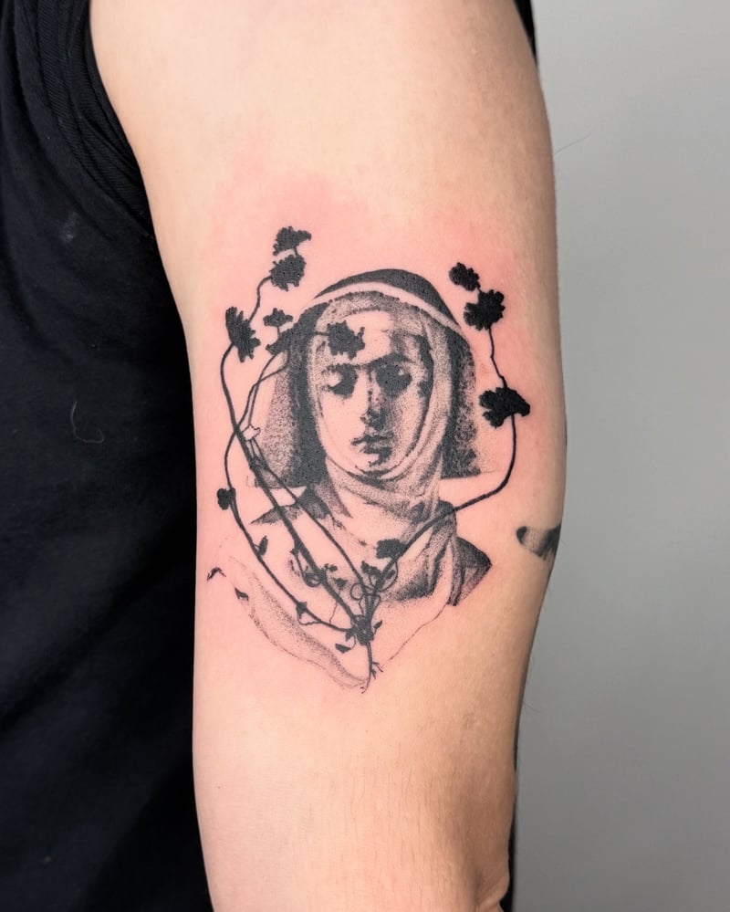 dotwork blackwork tattoo of a renaissance madonna wrapped in solid black ivy by Level tattoo, a blackwork tattoo artist in los feliz, los angeles